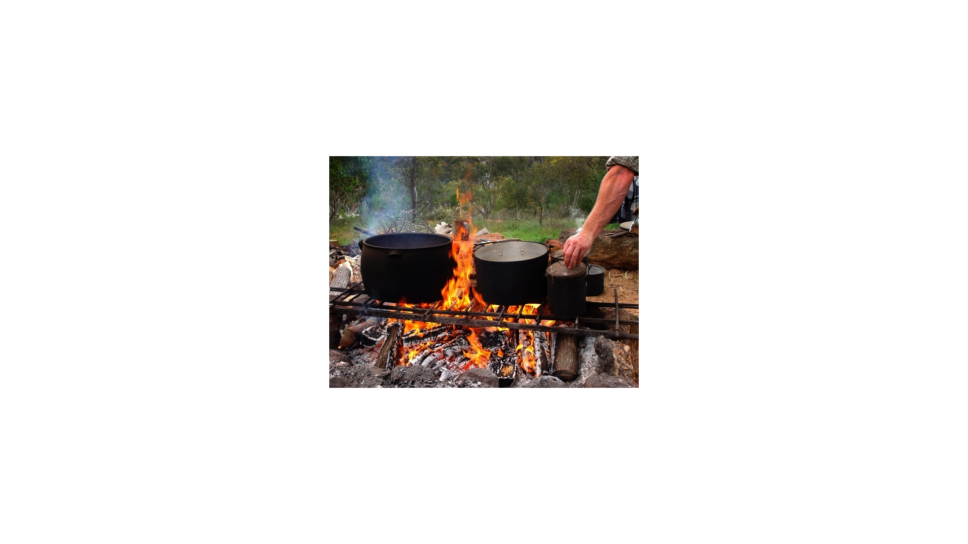 Cooking Pots and pans over a campfire