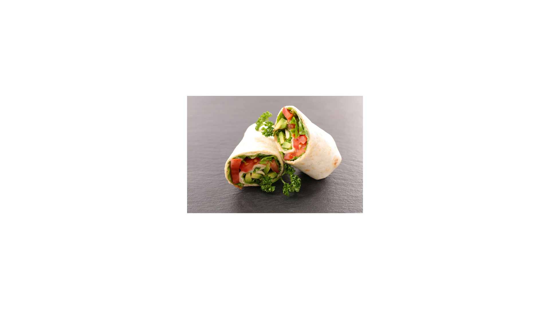 a vegetable wrap burrito on a table