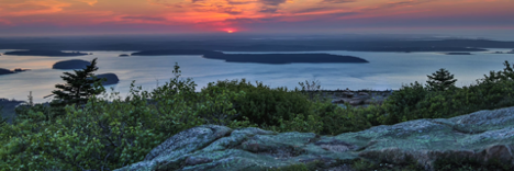 a sunset over a body of water