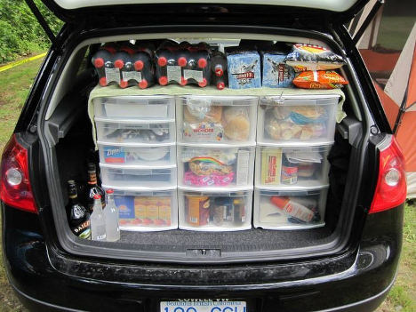 A car trunk full of organized supplies